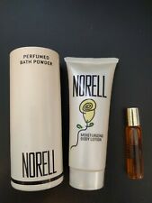 Norell Perfumed Bath Powder 2 Oz Body Lotion 1.5 Fl Oz And Trial Cologne.